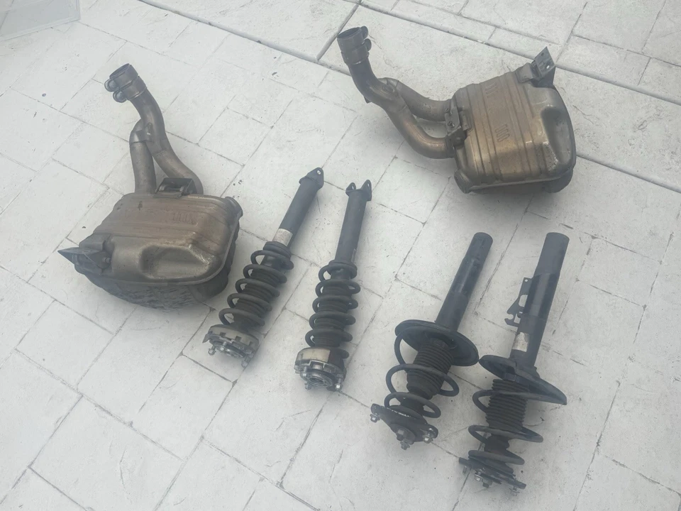 * 2005-2012 Porsche 997 911 Driver and Passenger Side Muffler and Struts - Image 1 of 1