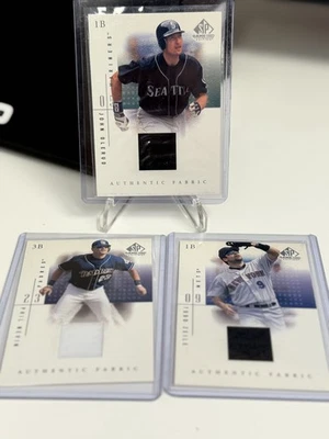 2001 SP Game Used Edition Authentic Fabric John Olerud/T. Zeile, P. Nevin - Image 1 of 2