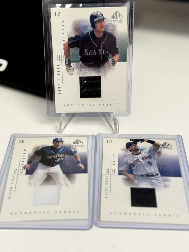 2001 SP Game Used Edition Authentic Fabric John Olerud/T. Zeile, P. Nevin - Image 1 of 2