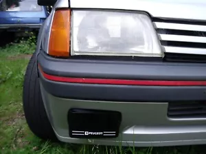 Peugeot 205 GTI FAHRLICHT LAMPENABDECKUNGEN - KEIN WERKZEUG ERFORDERLICH, UM ABDECKUNGEN ZU PASSEN -bk - Bild 1 von 22
