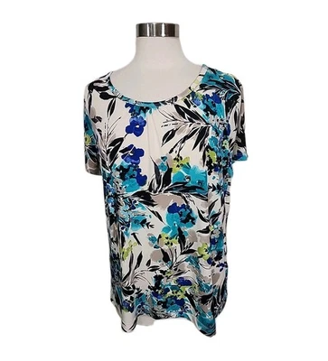 Top pulóver de manga corta floral azul tostado talla XL de Covington para mujer tejido elástico  Foto 1 de 4