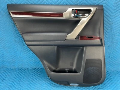 Panel de moldura interior de puerta trasera lado del conductor negro: LA20 2010-2013 OEM Lexus GX460 Foto 1 de 4