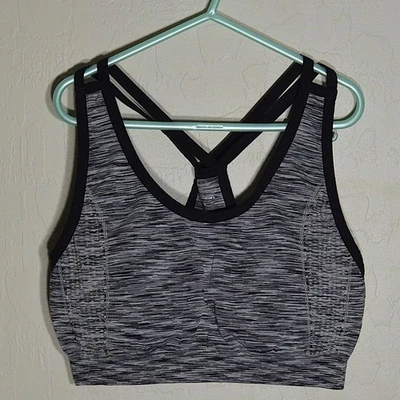 Sujetador deportivo Climawear gris medio blanco acolchado espalda deportiva negro tiras inalámbrico Foto 1 de 4