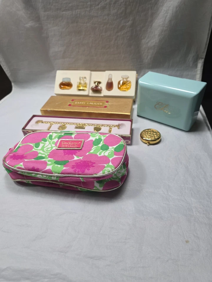 ESTEE LAUDER 香水小饰品手链透明小巧型,粉盒,普利策袋 — 第 1/4 张图片