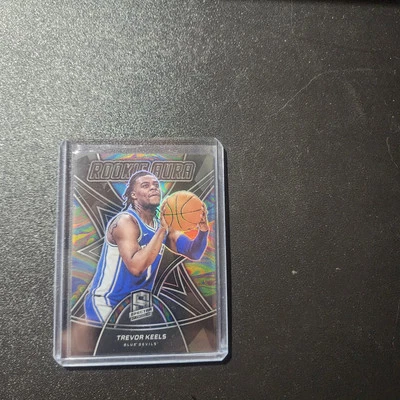 2022-23 Panini Chronicles Draft Picks - Spectra Rookie Aura #RA-TKE Trevor Keels - Image 1 of 2