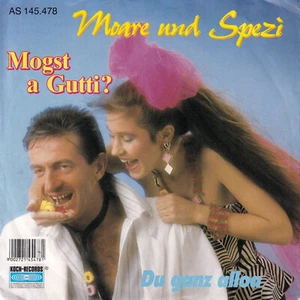 Moare und Spezi - Mogst a Gutti / Du Ganz Alloa (7" Vinyl-Single Austria 1987) - Bild 1 von 1