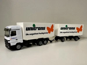 Herpa MB Actros LH Wechselbrücken Hängerzug „Nedlloyd / Unitrans“ - Bild 1 von 3