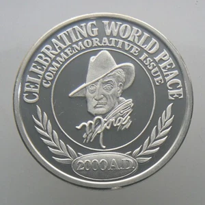 1 oz .999 Fine Silver - World Peace MIRA PARIS - Eagle Protecting Flaming Earth - Picture 1 of 2