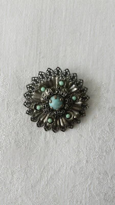 Broche tono peltre con piedras de aguamarina Foto 1 de 4