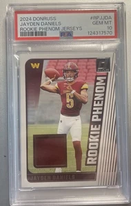 2024 Donruss Jayden Daniels Rookie Phenom Jerseys #RRJJDA PSA 10 Washington Comd - Picture 1 of 2