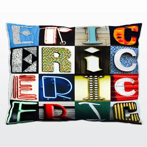 Personalized Pillow featuring the name ERIC in photos of actual sign letters - Picture 1 of 1