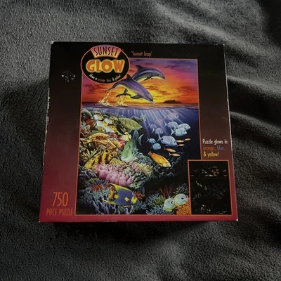 SUNSET GLOW "Sunset Leap" 750 peças Quebra-cabeça brilha em laranja, azul, amarelo - Imagem 1 de 3