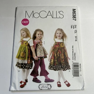 McCALL'S M6387 GIRLS EASY JUMPER DRESS TOP APRONS & PANTS PATTERN- UNCUT 6-7-8 - Image 1 of 4