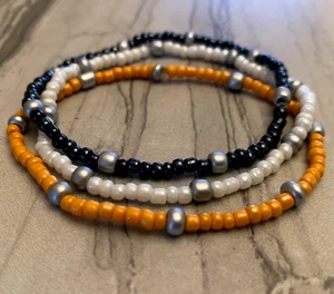Juego de 3 brazaletes elásticos con cuentas de semilla plateada negra naranja otoño negro blanco plateado - Imagen 1 de 3