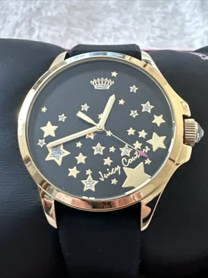 RELOJ JUICY COUTURE FERGIE TONO DORADO ESTRELLAS NEGRAS 1901493 NUEVO EN CAJA Foto 1 de 4