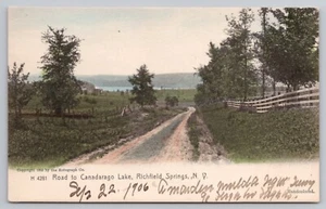 1906 Richfield Springs, NY - Canadarago Lake - Dirt Road, Rotograph UNP Postcard - Picture 1 of 3