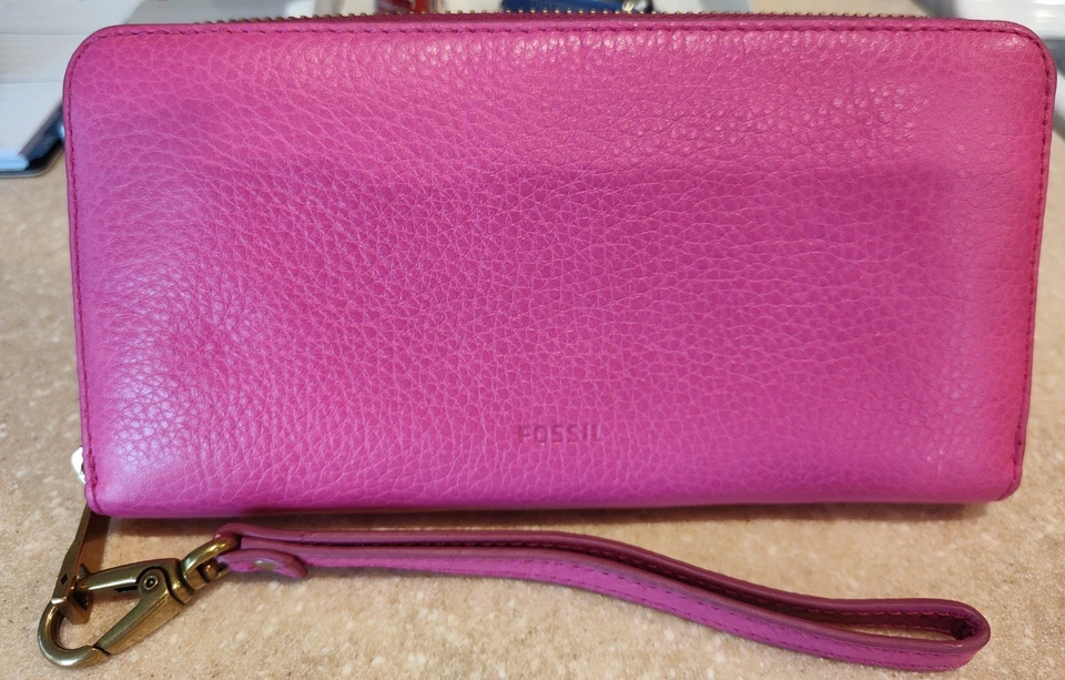 Cartera/muñequera fósil Foto 1 de 2