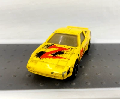 Tiras de velocidad Ertl Nissan 300ZX amarillas fundidas a presión Foto 1 de 4