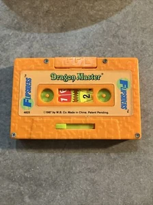 Vintage 1987 Milton Bradley Flipsiders Pocket Game Dragon Master Orange Cassette - Picture 1 of 4