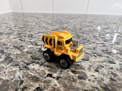 ВИНТАЖНЫЙ 1987 МИКРО МАШИНЫ ДОРОЖНЫЕ ЧЕМПИОНЫ ЖЕЛТЫЙ САМОСВАЛ  - Изображение 1 из 4