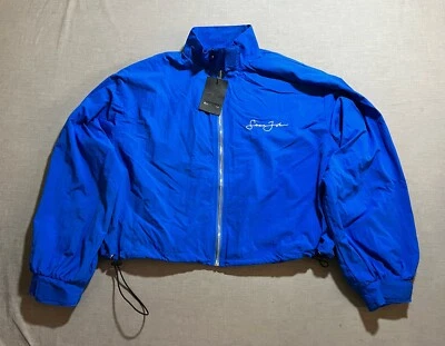 Chaqueta cortavientos Sean John x Missguided para mujer 4 azul recortada con cremallera. Foto 1 de 4