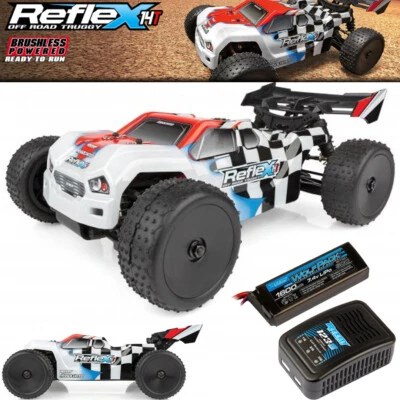 Associated 20176C 1:14 REFLEX 14T Off Road 4WD Brushless Truggy RTR w/Lipo Combo - Image 1 of 4