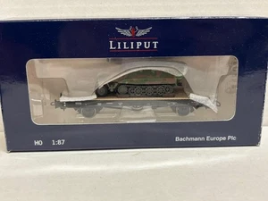 Liliput Flachwagen Omm DR Ep.II mit Schützenpanzer getarnt  221563 - Picture 1 of 1