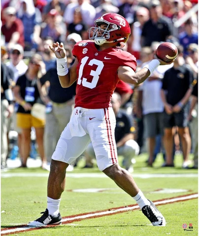 Tua Tagovailoa Alabama Crimson Tide Unsigned Red Jersey Throwing Photograph Cover