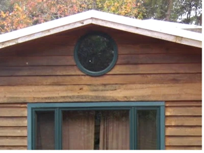 Andersen Round Window Green Flange with interior Wood Trim piece - Image 1 of 4