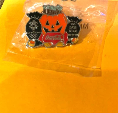 SALT LAKE CITY OLYMPICS COCA COLA HALLOWEEN PIN COUNTDOWN PUMPKIN BOTTLES CANDY - Image 1 of 2