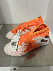 NEU Adidas Nemesis FG fester Untergrund Fußballschuhe Jungen Gr. 1 orange weiß FW7354 - Bild 1 von 5