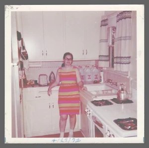 Found Photo 1972 Woman Striped Orange Dress In Kitchen 3.5 x 3.5  - Picture 1 of 2