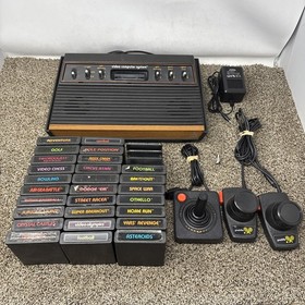 Atari 2600 System Bundle with Console, 30 Games, Joystick, Paddles, and More LOT