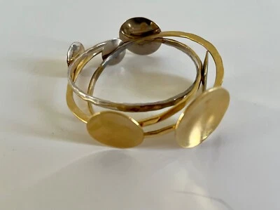 Nuevos brazaletes flotantes de latón chapado en oro de plata esterlina Robert Lee Morris Foto 1 de 4