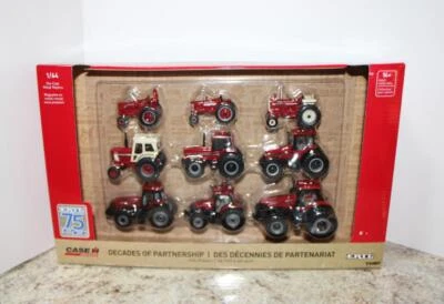 NIP Ertl 75th Anniversary Case IH DECADES OF PARTNERSHIP 9 pc Tractor Set 1/64 - Image 1 of 4