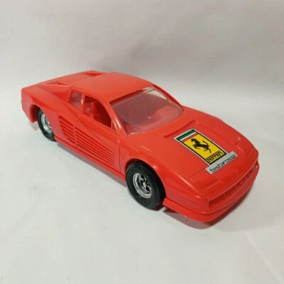 Coche deportivo vintage Tootsie Toy Ferrari Testarossa rojo cromo negro ruedas 12" Foto 1 de 4