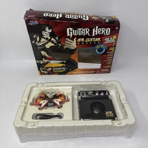 Guitar Hero Jada Air Guitar Rocker 10 Riffs 5 Tracks - Open Box Never Used - Picture 1 of 7
