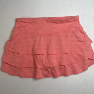 Falda de tenis Athleta Swagger Skort en capas mediana naranja neón a rayas punto pickleball Foto 1 de 4