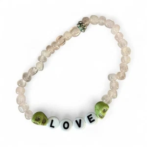 Stretcharmband Rosenquarz Steine & grüner Totenkopf Liebe Perlen - Bild 1 von 1