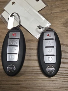 Lot of 2 Used OEM Nissan Smart Keys.  Keys are cut. - Picture 1 of 2