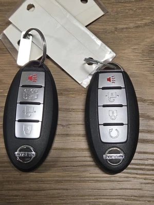 Lot of 2 Used OEM Nissan Smart Keys.  Keys are cut. - Image 1 of 2