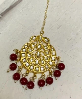 Joyería de frente tradicional estilo bollywood tono dorado kundan maang tikka Foto 1 de 2