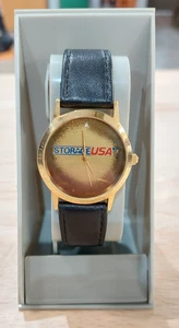 Aufbewahrung USA Ladeneinrichtung Promo goldfarbene Uhr schwarzes Lederarmband Unisex - Bild 1 von 3