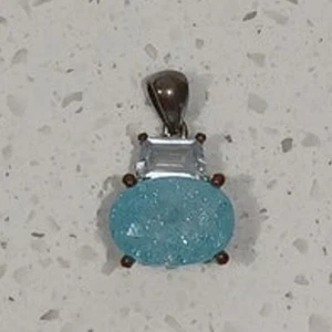 Pendant featuring an aquamarine gemstone, Stone light blue, oval-shaped gem - Picture 1 of 4