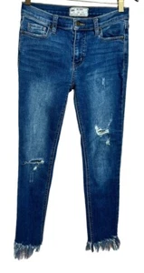 Pantalones de mezclilla ajustados con dobladillo crudo Free People talla 25 elásticos 25" entrepierna de mediana altura - Imagen 1 de 7