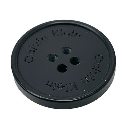 Calvin Klein Plástico Negro Principal Frontal Plano con Llanta Botón de Repuesto 1" Foto 1 de 3