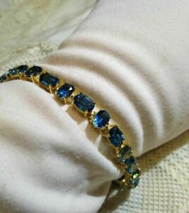 38Ct Oval Created London Blue Topaz 7" Tennis Bracelet in 14K Yellow Gold Over