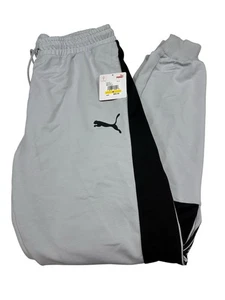 Puma Crossover Hose NEU Herren M grau mit schwarzem Logo Kordelzug Training Jogginghose - Bild 1 von 7