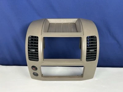 05-12 2008 NISSAN FRONTIER PATHFINDER TAN CENTER RADIO DASH TRIM BEZEL OEM NICE - Image 1 of 4