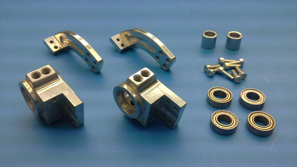 Original Lauterbacher Alu-Achsschenkel / Lenkhebel für Carson Attack vorne   - Bild 1 von 1